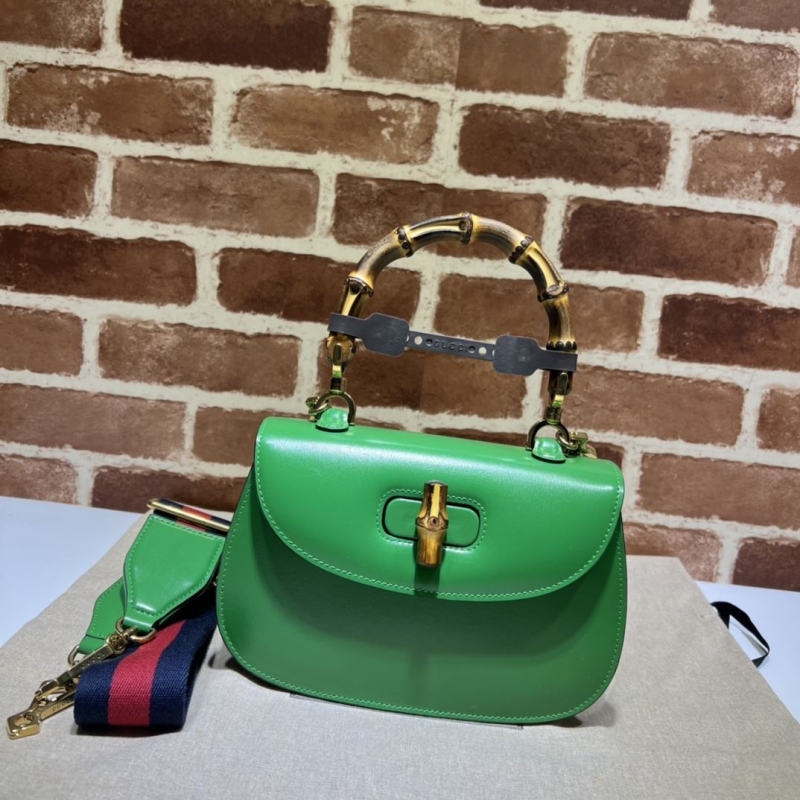 G*u*i top handle bags